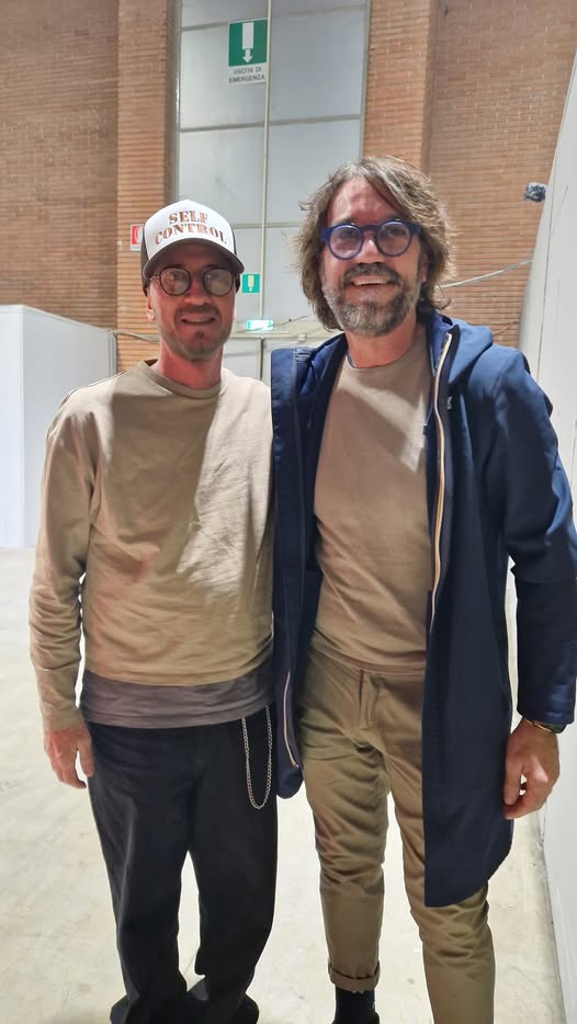 Con il cantante Raf
